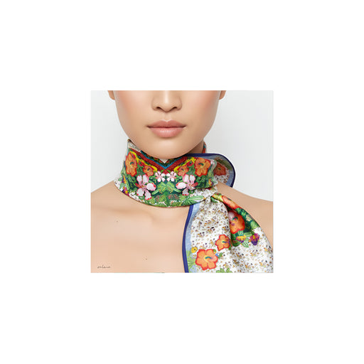 Onlewo 'Glorious Nyonya' silk scarf styled — vibrant Peranakan nyonya figures in garden setting, bold colours inspired by European, Malay and Chinese cultures