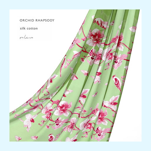 Onlewo 'Orchid Rhapsody' 65cm x 200cm silk cotton scarf — vibrant orchid design celebrating Singapore's natural heritage and garden city identity