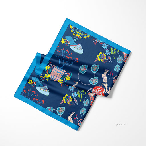 Onlewo 'Peranakan Story' silk pocket square styled — vibrant Peranakan cultural symbols on 100% silk, 33cm x 33cm, designed in Singapore by Onlewo